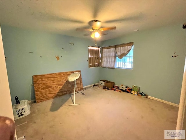 miscellaneous room featuring carpet flooring and ceiling fan