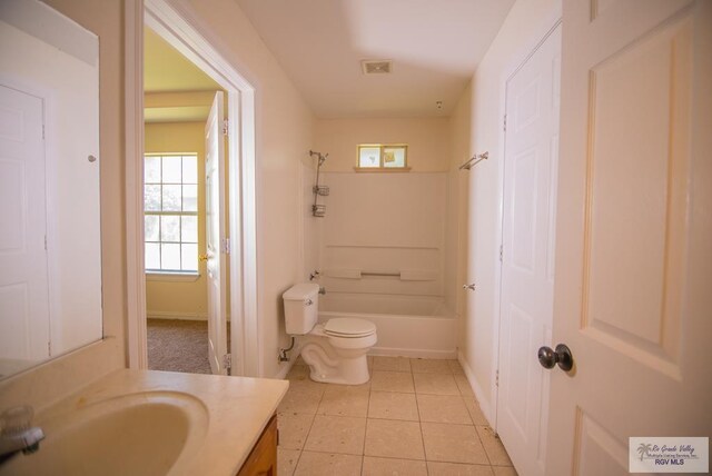 3630 Sun Dr, Harlingen, TX 78552 - full bathroom featuring vanity, toilet, baseboards, and tile patterned flooring