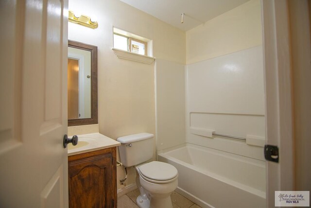 3630 Sun Dr, Harlingen, TX 78552 - full bathroom with vanity, toilet, tile patterned floors, and bathtub / shower combination
