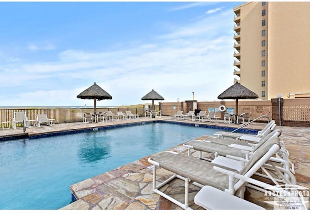 view of swimming pool featuring a patio