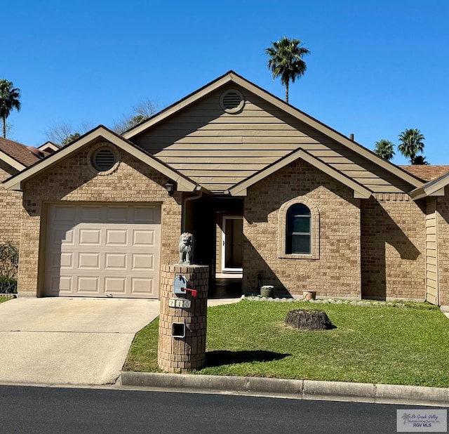 ranch-style home featuring an attached garage, concrete driveway, brick siding, and a front yard