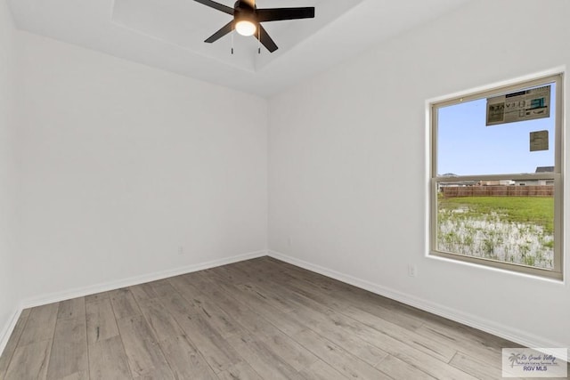 1838 Castillo St, Olmito, TX 78575 - empty room with wood finished floors and ceiling fan