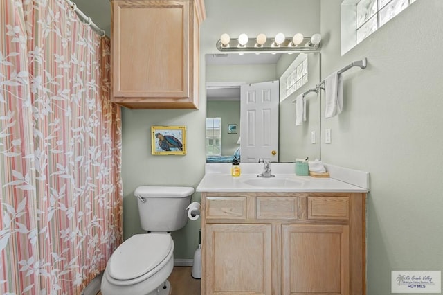 106 Atol St Unit 7, South Padre Island, TX 78597 - full bathroom with vanity, toilet, and curtained shower