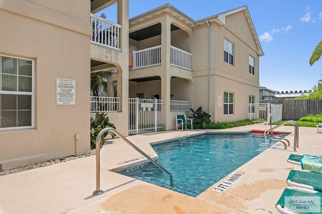 106 Atol St Unit 7, South Padre Island, TX 78597 - community pool with a patio area