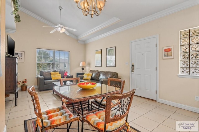 106 Atol St Unit 7, South Padre Island, TX 78597 - dining area featuring light tile patterned floors, a ceiling fan, crown molding, a chandelier, and baseboards