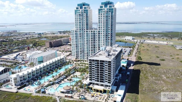 birds eye view of property with a water view