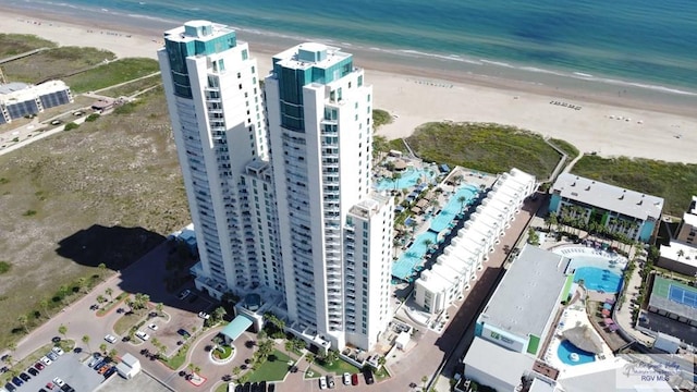 aerial view featuring a water view and a view of the beach