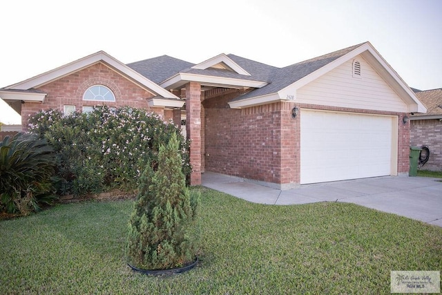 ranch-style house with a garage and a front lawn