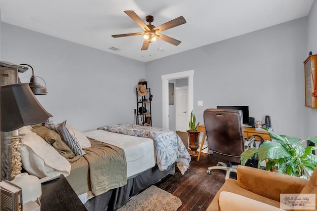 bedroom featuring ceiling fan and dark hardwood / wood-style flooring