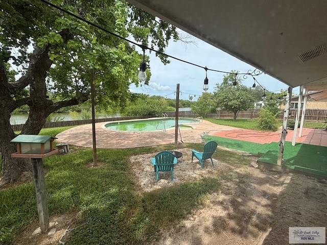 200 E Resaca Dr, Los Fresnos, TX 78566 - view of pool with a fenced backyard and a patio area