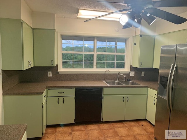 kitchen featuring black dishwasher, stainless steel refrigerator with ice dispenser, sink, backsplash, and plenty of natural light