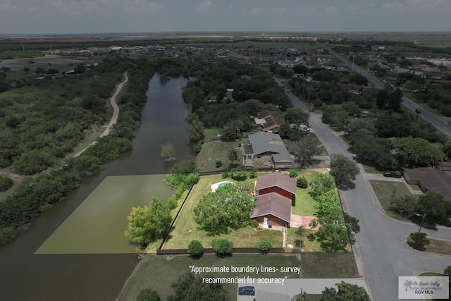 200 E Resaca Dr, Los Fresnos, TX 78566 - aerial overview of property's location featuring a large body of water and property parcel outlined