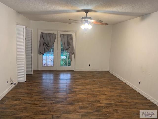 200 E Resaca Dr, Los Fresnos, TX 78566 - spare room with dark wood finished floors, a textured ceiling, and a ceiling fan