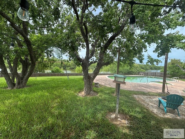 200 E Resaca Dr, Los Fresnos, TX 78566 - view of home's community featuring a swimming pool