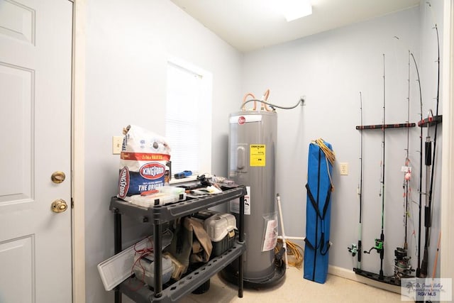 utility room with electric water heater