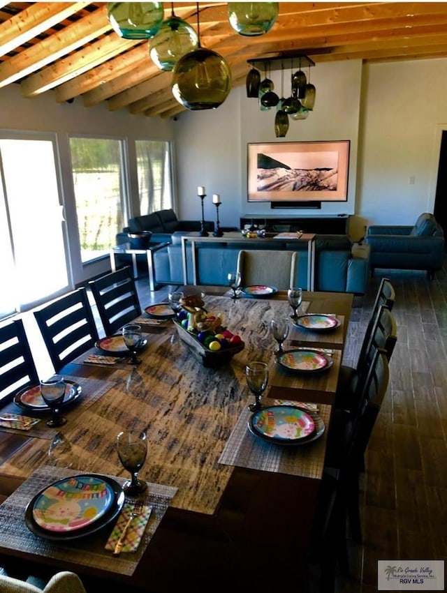 dining room with lofted ceiling with beams, wooden ceiling, and wood-type flooring