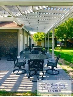 view of patio / terrace featuring a pergola