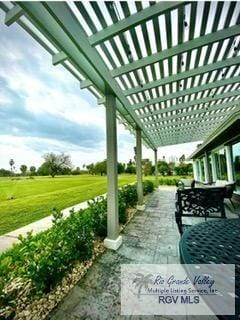 view of patio featuring a pergola