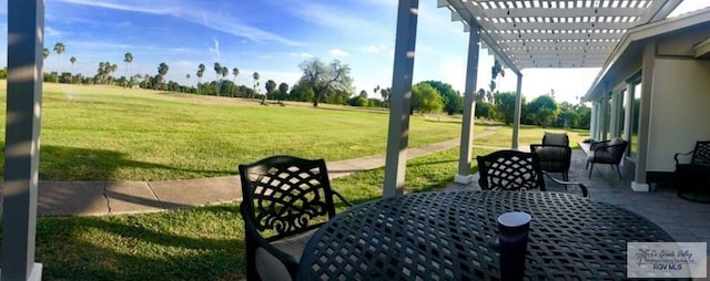 view of yard with a pergola and a patio area