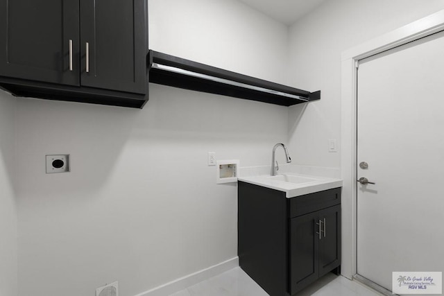 laundry room featuring washer hookup, electric dryer hookup, cabinets, and sink