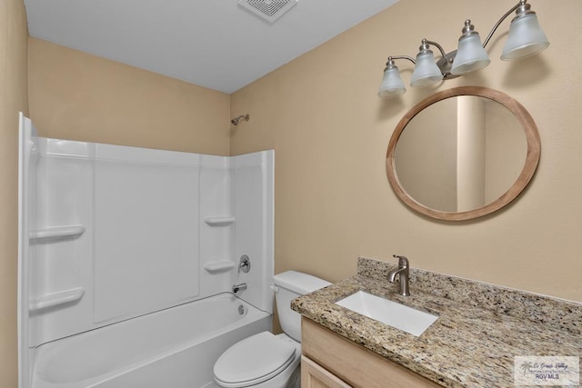 full bathroom featuring vanity, shower / tub combination, and toilet