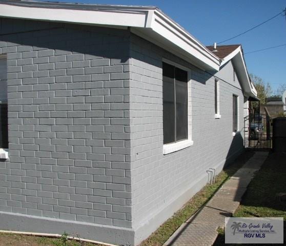 view of home's exterior featuring brick siding