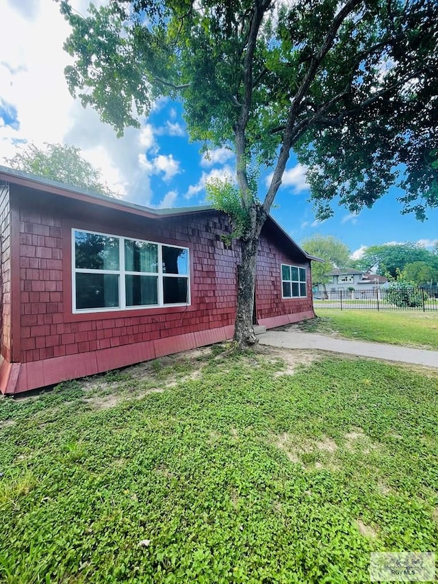 exterior space with a lawn