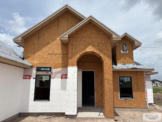 2348 W Dorcas Cir, Brownsville, TX 78521 - rear view of house with stucco siding