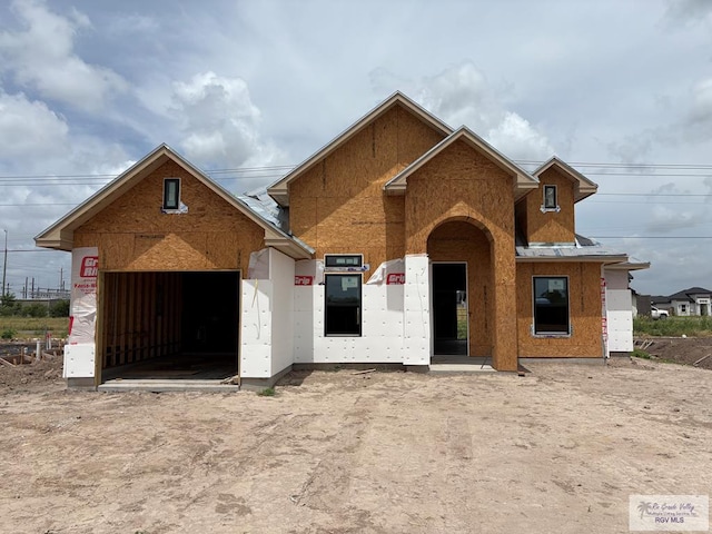 2348 W Dorcas Cir, Brownsville, TX 78521 - property in mid-construction featuring an attached garage