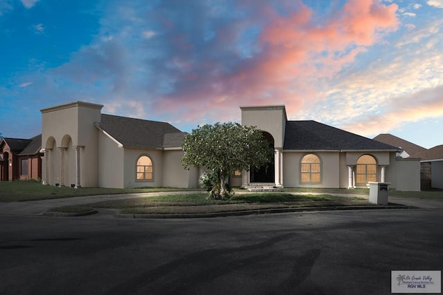 2360 Deer Run Cir, Brownsville, TX 78521 - view of front of house with stucco siding