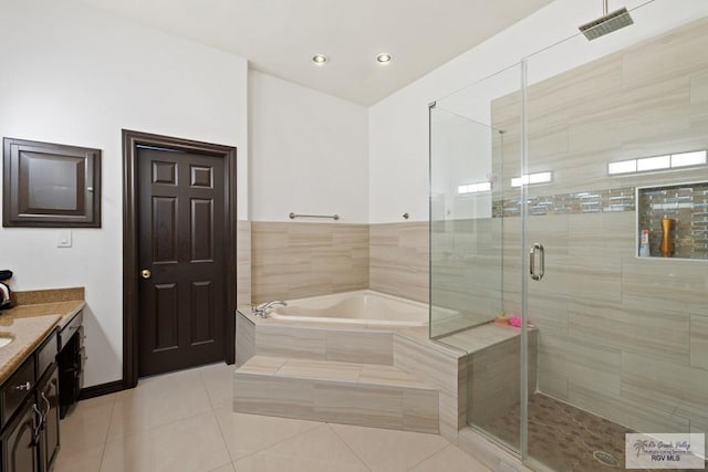 2360 Deer Run Cir, Brownsville, TX 78521 - bathroom with tile patterned flooring, a bath, a shower stall, vanity, and recessed lighting