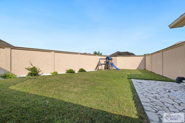 2360 Deer Run Cir, Brownsville, TX 78521 - view of yard with a playground and a patio