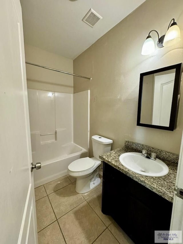 full bathroom featuring tile patterned flooring, vanity,  shower combination, and toilet