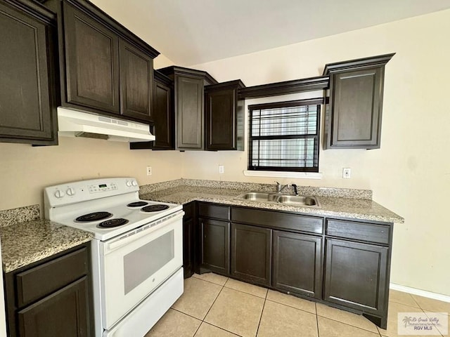 kitchen featuring white range with electric stovetop, dark brown cabinetry, light tile patterned floors, and sink