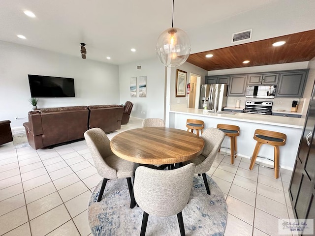 77 Santa Isabel Blvd, Laguna Vista, TX 78578 - dining room with recessed lighting, light tile patterned floors, and baseboards