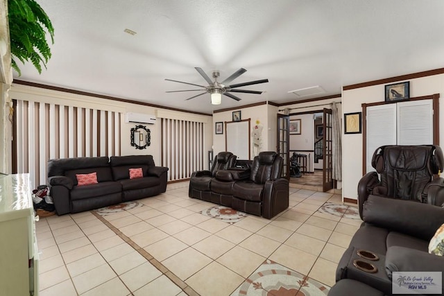 living room featuring a wall unit AC, ceiling fan, crown molding, and light tile patterned flooring