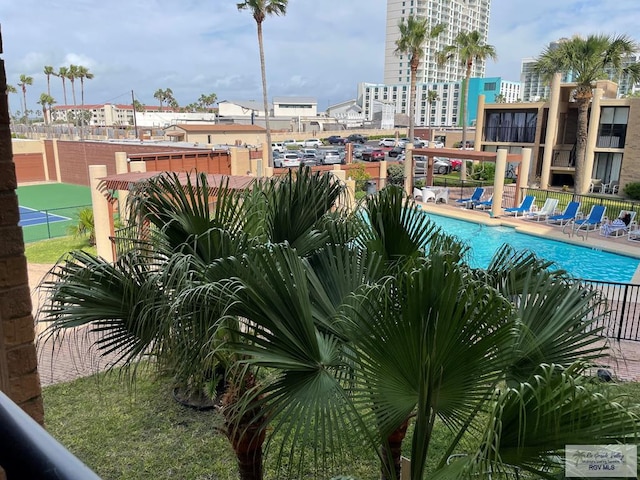 110 Padre Blvd Unit 202, South Padre Island, TX 78597 - pool featuring fence