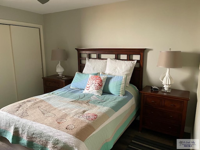 110 Padre Blvd Unit 202, South Padre Island, TX 78597 - bedroom featuring a closet and wood finished floors