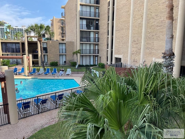 110 Padre Blvd Unit 202, South Padre Island, TX 78597 - community pool with a patio area