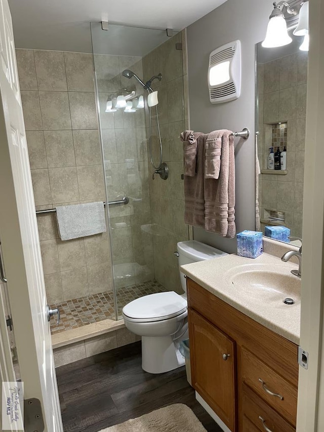 110 Padre Blvd Unit 202, South Padre Island, TX 78597 - bathroom with wood finished floors, vanity, and a stall shower
