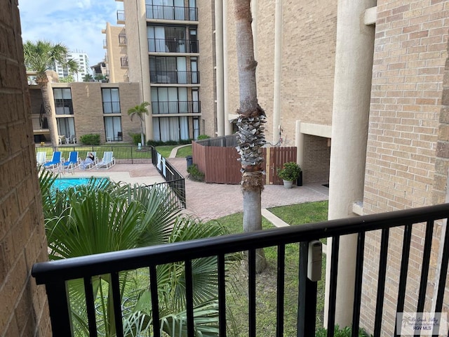 110 Padre Blvd Unit 202, South Padre Island, TX 78597 - balcony featuring view of pool area