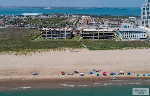 110 Padre Blvd Unit 202, South Padre Island, TX 78597 - drone / aerial view featuring a water view, a view of city, and a beach view