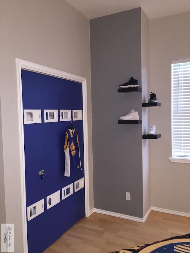 interior details featuring wood-type flooring