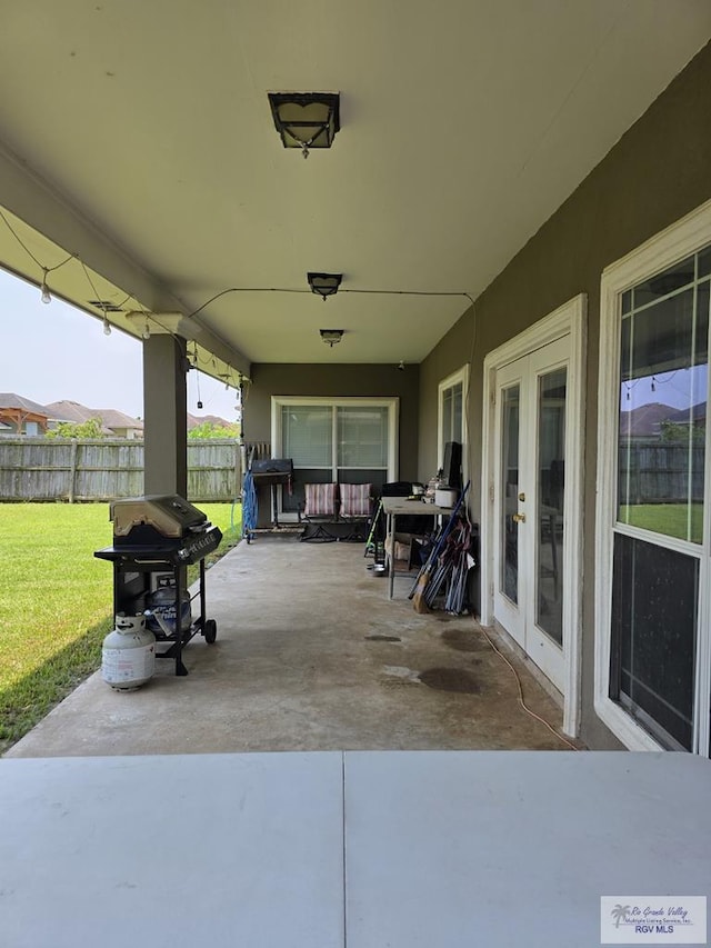 7301 Alabama Pine St, Brownsville, TX 78535 - view of patio / terrace featuring area for grilling and french doors