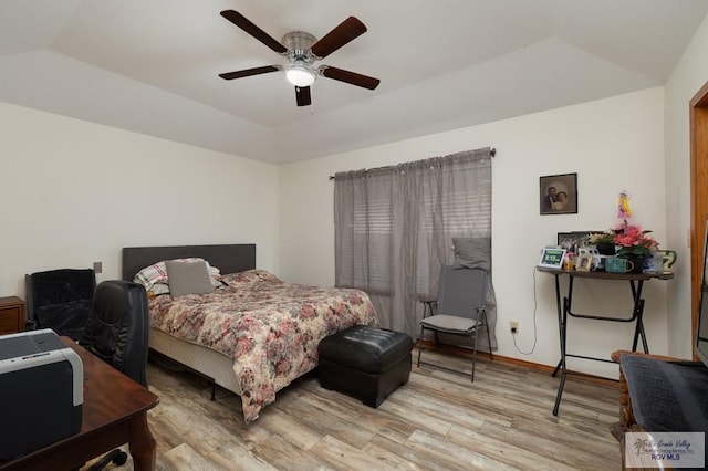 6246 Camelot Dr, Harlingen, TX 78550 - bedroom featuring light wood-style floors, vaulted ceiling, ceiling fan, and baseboards