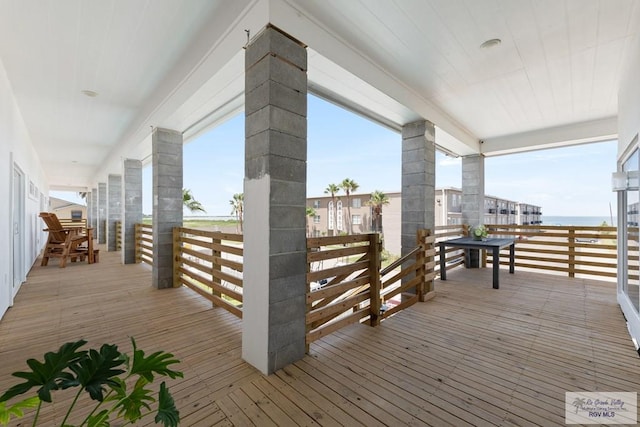 112 W Sunny Isle Dr, South Padre Island, TX 78597 - wooden deck featuring a water view