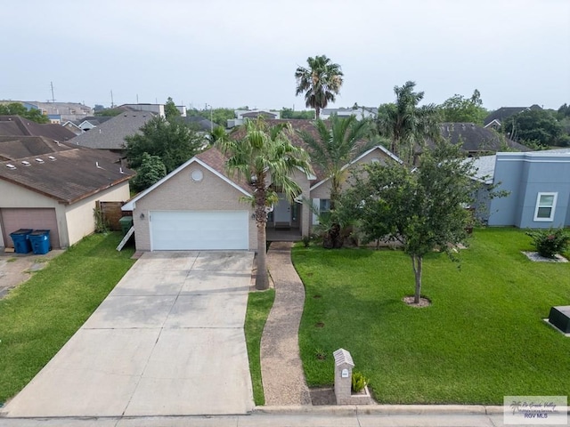 view of front of property with a garage, concrete driveway, and a front yard