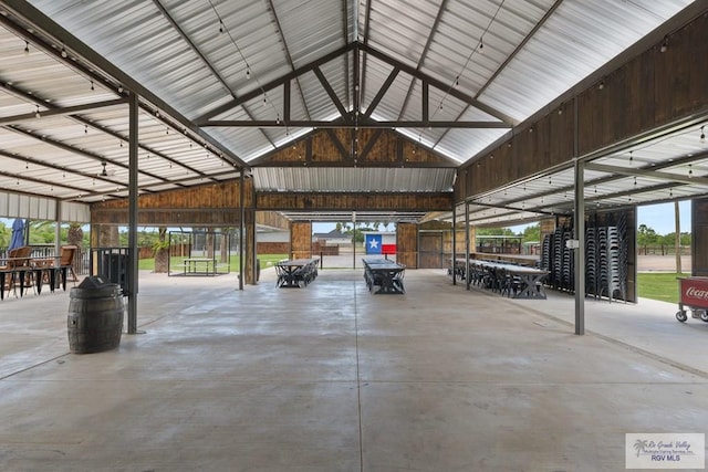 garage featuring wood walls