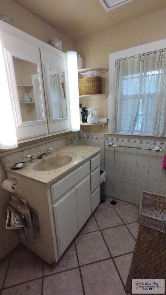 515 Honeydale Rd, Brownsville, TX 78520 - bathroom with vanity and tile patterned floors
