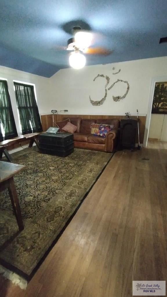 515 Honeydale Rd, Brownsville, TX 78520 - living room featuring a ceiling fan and wood finished floors